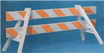[Image Description: An orange and white stripped parade barricade.]