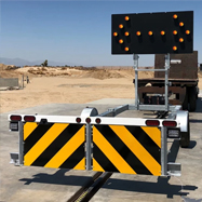 [Image Description: A tow behind trailer with a digital sign mounted on it.]